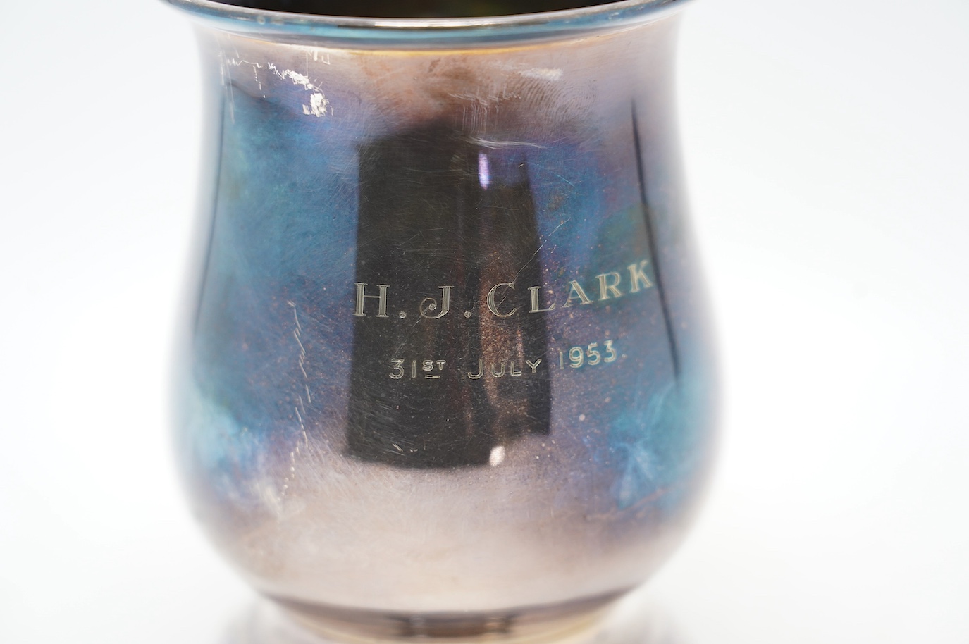A George V silver baluster mug, with later engraved inscription, Joseph Gloster Ltd, Birmingham, 1934, height 13.8cm, 10.9oz. Condition - fair